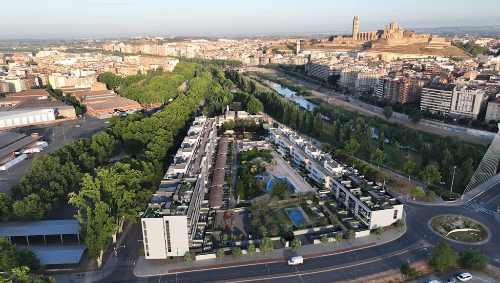 Render fotomontaje exterior sobre imagen de dron de conjunto residencial